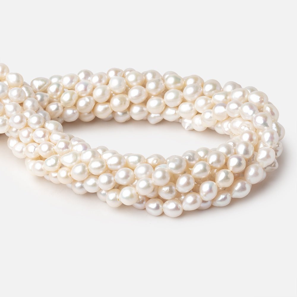 6x6-8x6.5mm White Petite Ultra Baroque Freshwater Pearls 16 inch 57 pieces - Beadsofcambay.com