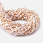 7-9mm Peach Straight Drilled Keshi Freshwater Pearls 16 inch 54 pieces - Beadsofcambay.com