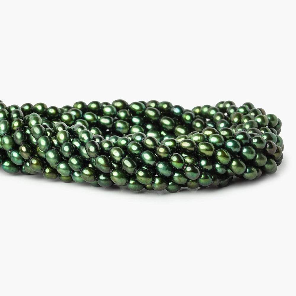 7mm Emerald Green Straight Drilled Oval Pearls, 15 inch, 63 pieces - Beadsofcambay.com