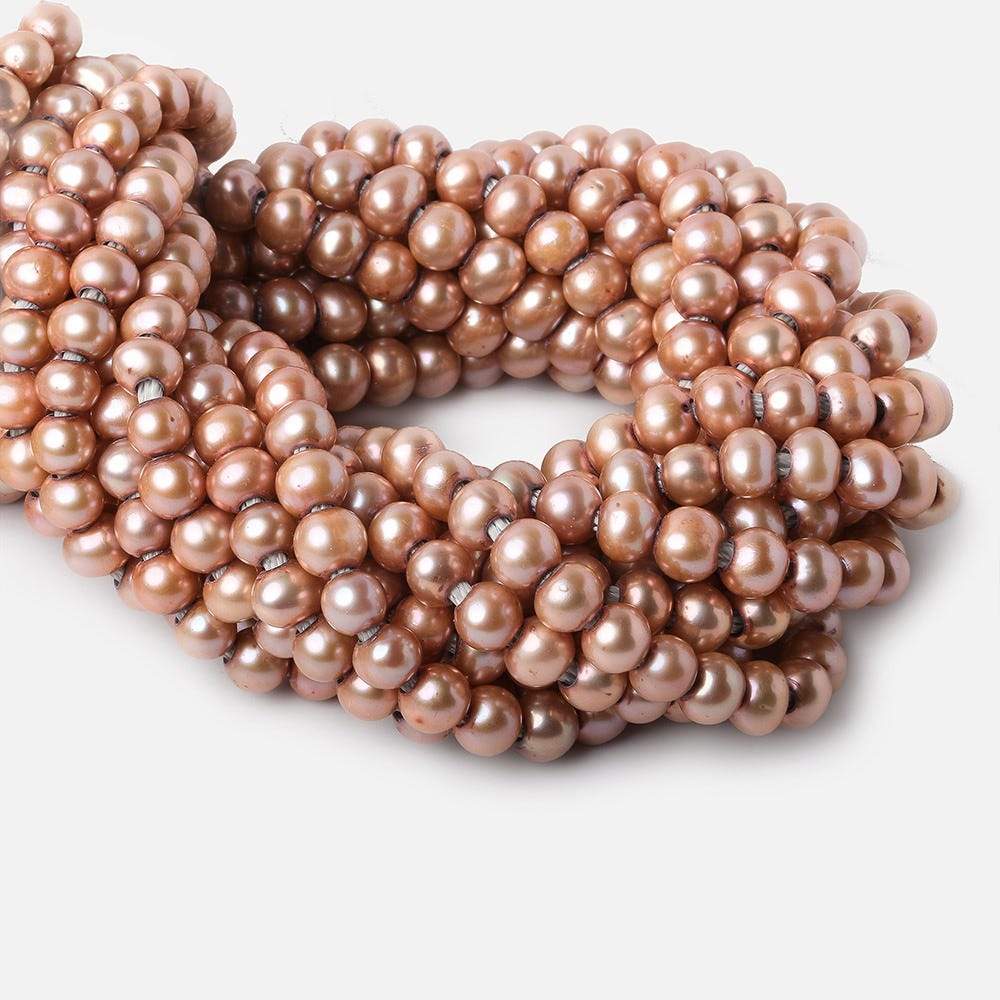 7mm Salmon Large Hole Off Round Freshwater Pearls 15 inches 65 pieces - Beadsofcambay.com