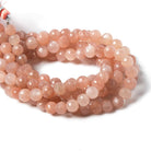 7mm Sunstone & Angel Skin Moonstone faceted rounds 8 inch 32 Beads - Beadsofcambay.com