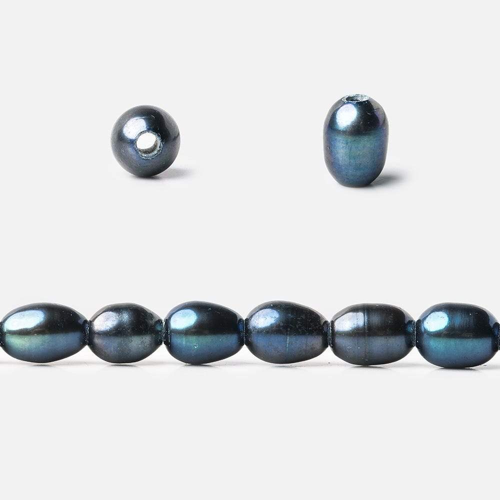 7x5-8x5mm Indigo Blue Large Hole Oval Freshwater Pearls 1.5mm drill hole 15 inch 48 pcs - Beadsofcambay.com