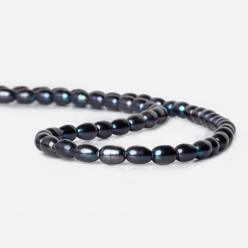 7x5-8x5mm Indigo Blue Large Hole Oval Freshwater Pearls 1.5mm drill hole 15 inch 48 pcs - Beadsofcambay.com