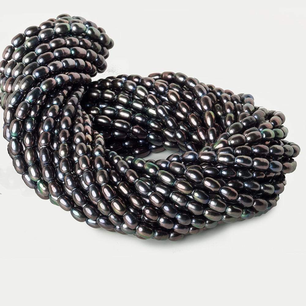 7x5-8x5mm Peacock Large Hole Oval Freshwater Pearls 1.5mm drill hole 15 inch 48 pcs - Beadsofcambay.com