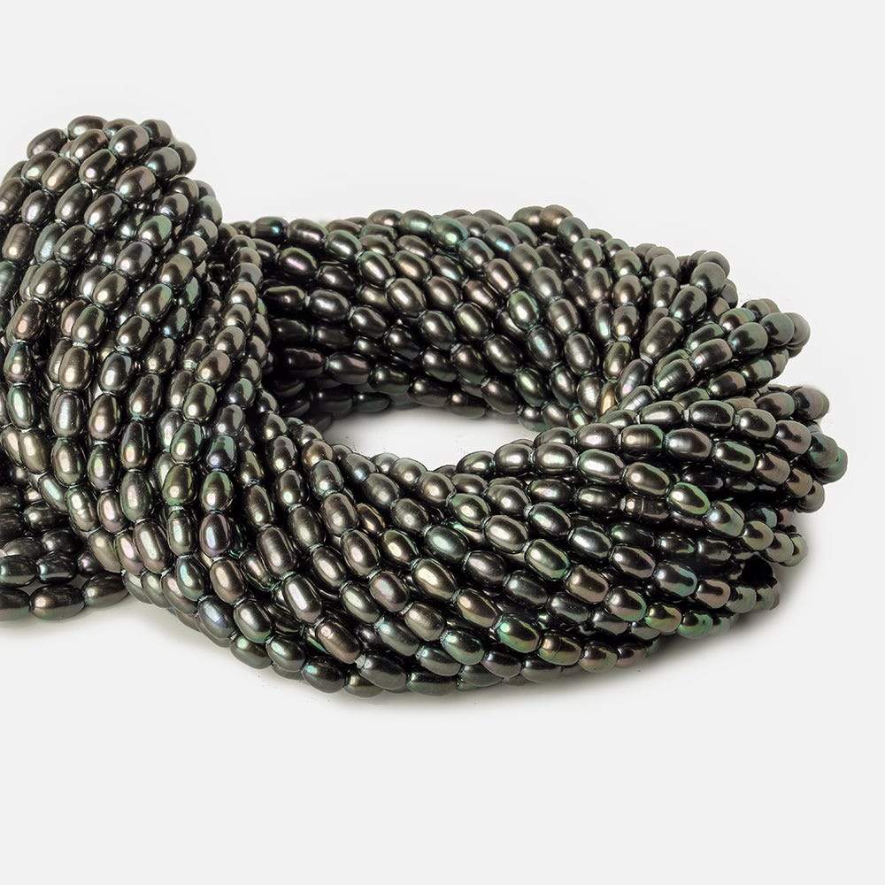 7x5-8x5mm Platinum Iridescent Large Hole Oval Freshwater Pearls 1.5mm drill hole 15 inch 48 pcs - Beadsofcambay.com