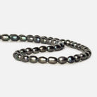 7x5-8x5mm Platinum Iridescent Large Hole Oval Freshwater Pearls 1.5mm drill hole 15 inch 48 pcs - Beadsofcambay.com