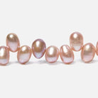 7x5-8x6mm Peachy Pink Top Drilled Oval Freshwater Pearls 16 inch 74 pieces - Beadsofcambay.com