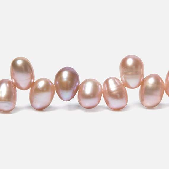 7x5-8x6mm Peachy Pink Top Drilled Oval Freshwater Pearls 16 inch 74 pieces - Beadsofcambay.com