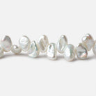 7x5-9x6mm White Top Drilled Keshi Freshwater Pearl 16 inch 74 pieces - Beadsofcambay.com