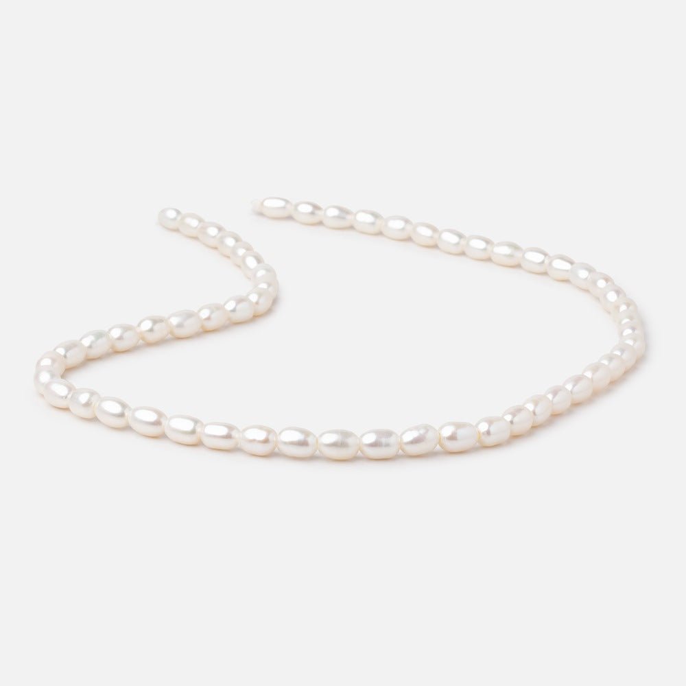 7x5mm Cream 1.5mm Large Hole Oval Freshwater Pearls 16 inch 56 pieces - Beadsofcambay.com