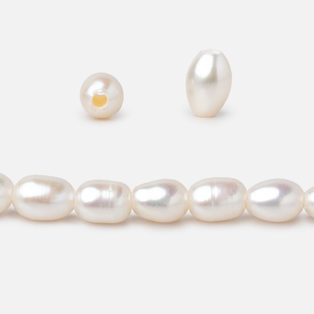 7x5mm Cream 1.5mm Large Hole Oval Freshwater Pearls 16 inch 56 pieces - Beadsofcambay.com