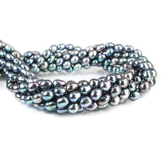 7x5mm Iridescent Aqua Straight Drilled Oval Freshwater Pearl 15 inch - Beadsofcambay.com