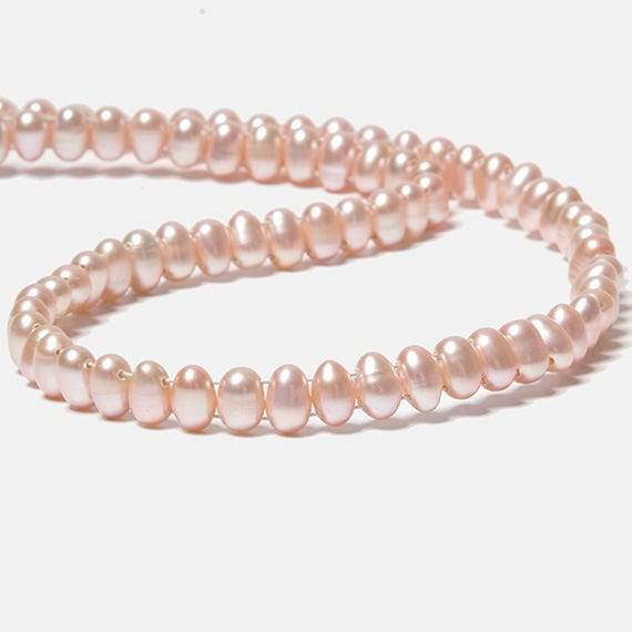 7x5mm Sunset Peach Double Drilled Oval Freshwater Pearls 15.5 inch 76 pieces - Beadsofcambay.com