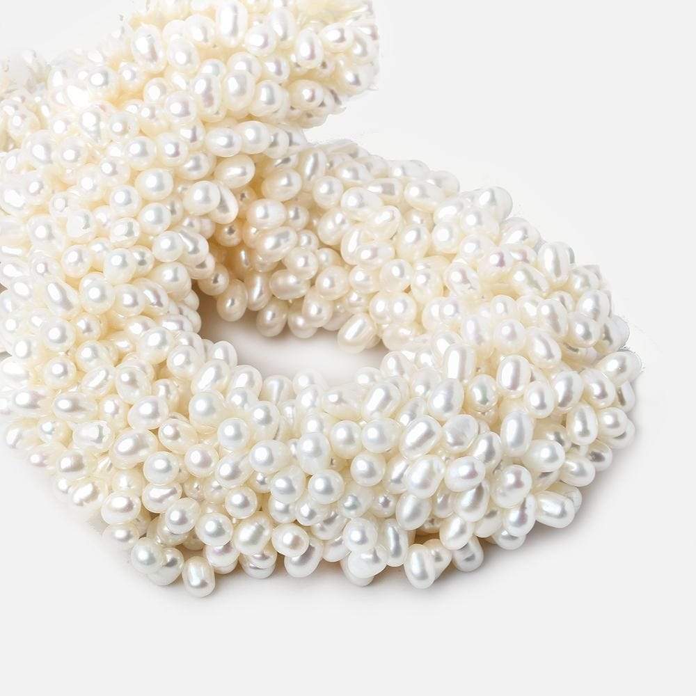 7x5mm White Top Drilled Oval Freshwater Pearls 15.5 inch 90 pieces - Beadsofcambay.com