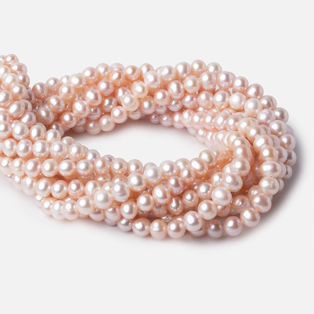 7x6mm Orchid Pink Off Round Freshwater Pearls 67 pieces AAA - Beadsofcambay.com