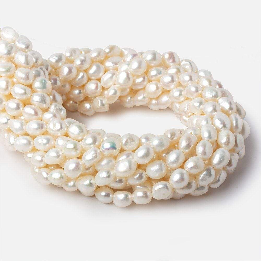 7x8 - 8x9.5mm Off White Straight Baroque Freshwater Pearls 16 inch 46 pieces - Beadsofcambay.com