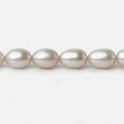 7x9-7x10mm Silver Champagne Straight Drill Oval Freshwater Pearl 16 inch 40 pieces A - Beadsofcambay.com