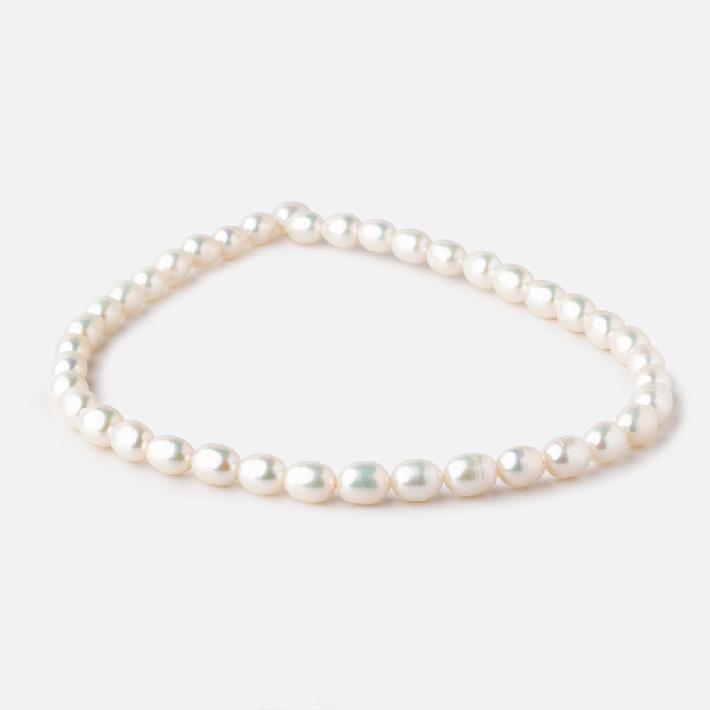 7x9-8x10mm Cream Straight Drilled Oval Freshwater Pearls 15 inch 40 pieces - Beadsofcambay.com