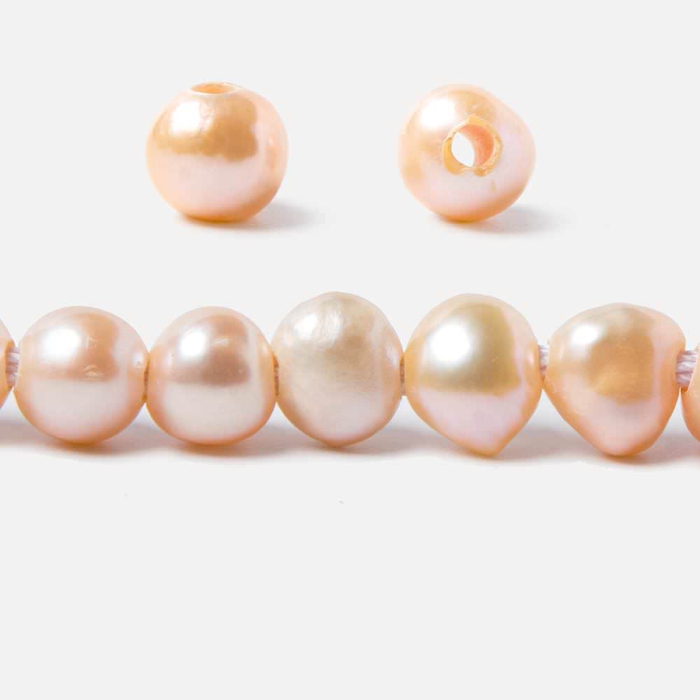 8-10.5mm Dark Salmon Baroque 2.5mm Large Hole Pearls 15 inch 49 pieces - Beadsofcambay.com