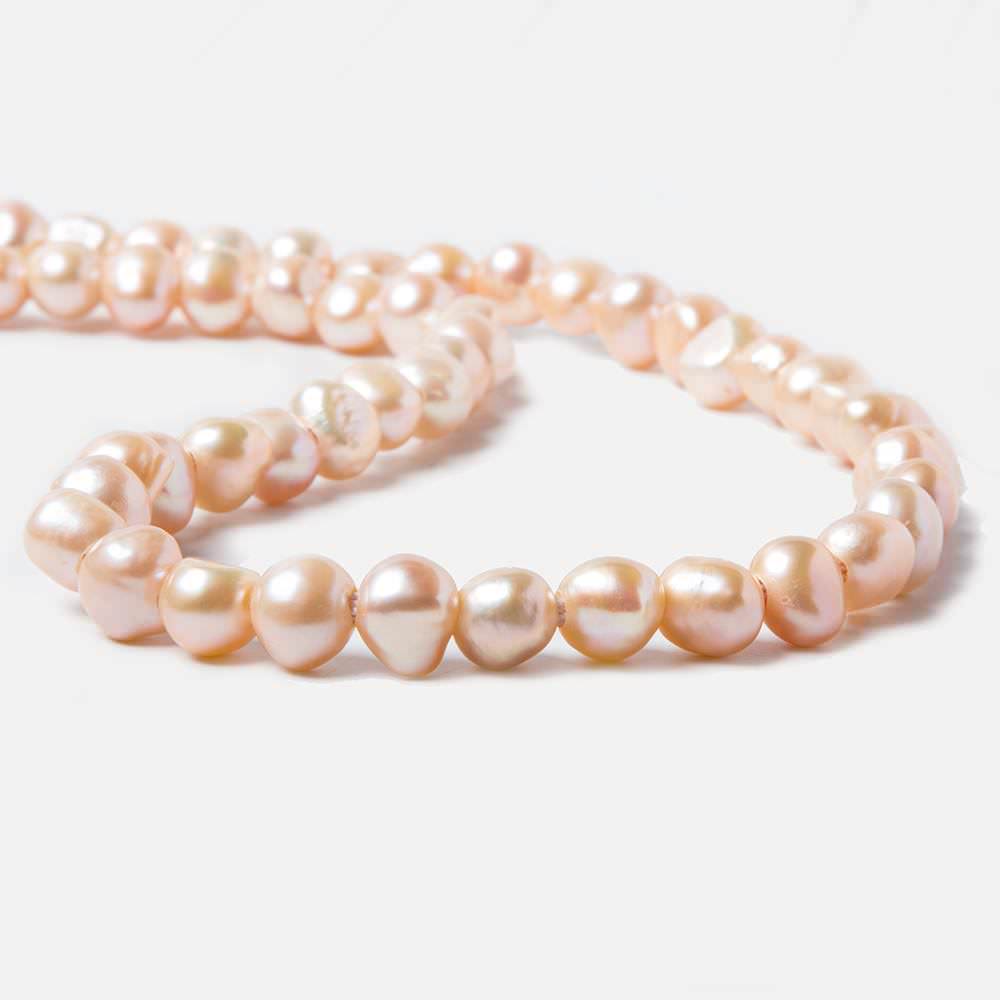 8-10.5mm Dark Salmon Baroque 2.5mm Large Hole Pearls 15 inch 49 pieces - Beadsofcambay.com