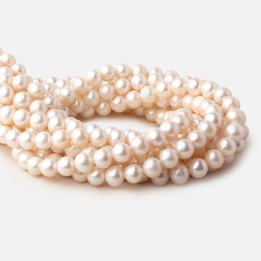 8.5x8-9.5x9mm Off White Off Round freshwater pearls 16 inch 47 pieces - Beadsofcambay.com