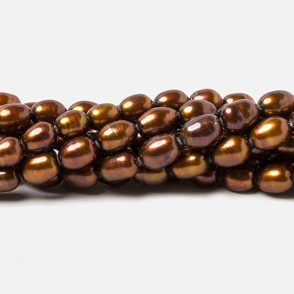 8x5mm Chocolate Brown straight drilled oval pearls 16 inch 55 pieces - Beadsofcambay.com