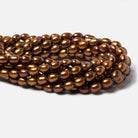 8x5mm Chocolate Brown straight drilled oval pearls 16 inch 55 pieces - Beadsofcambay.com