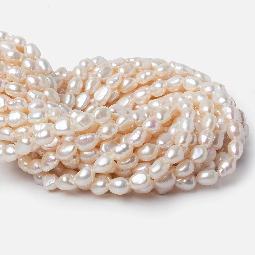 8x7-9x7mm Off White Straight Drilled Baroque Freshwater Pearls 16 inch 44 pcs - Beadsofcambay.com