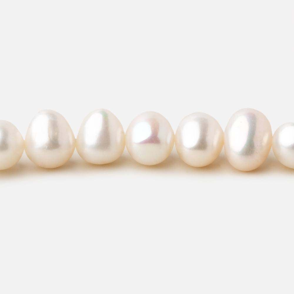 8x7mm Off White side drilled Baroque freshwater pearls 15.5 inch 55 pieces A - Beadsofcambay.com