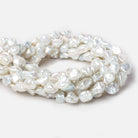 8x7x5-10x8x6mm White Straight Drilled Keshi Freshwater Pearls 16 inch 46 pieces - Beadsofcambay.com