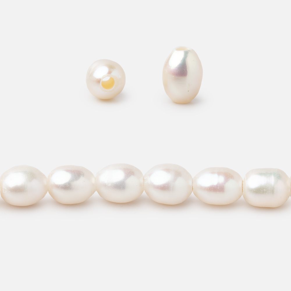 6x4.5mm Off White Oval 1.5mm Drill Hole Freshwater Pearls 61 pieces - BeadsofCambay.com