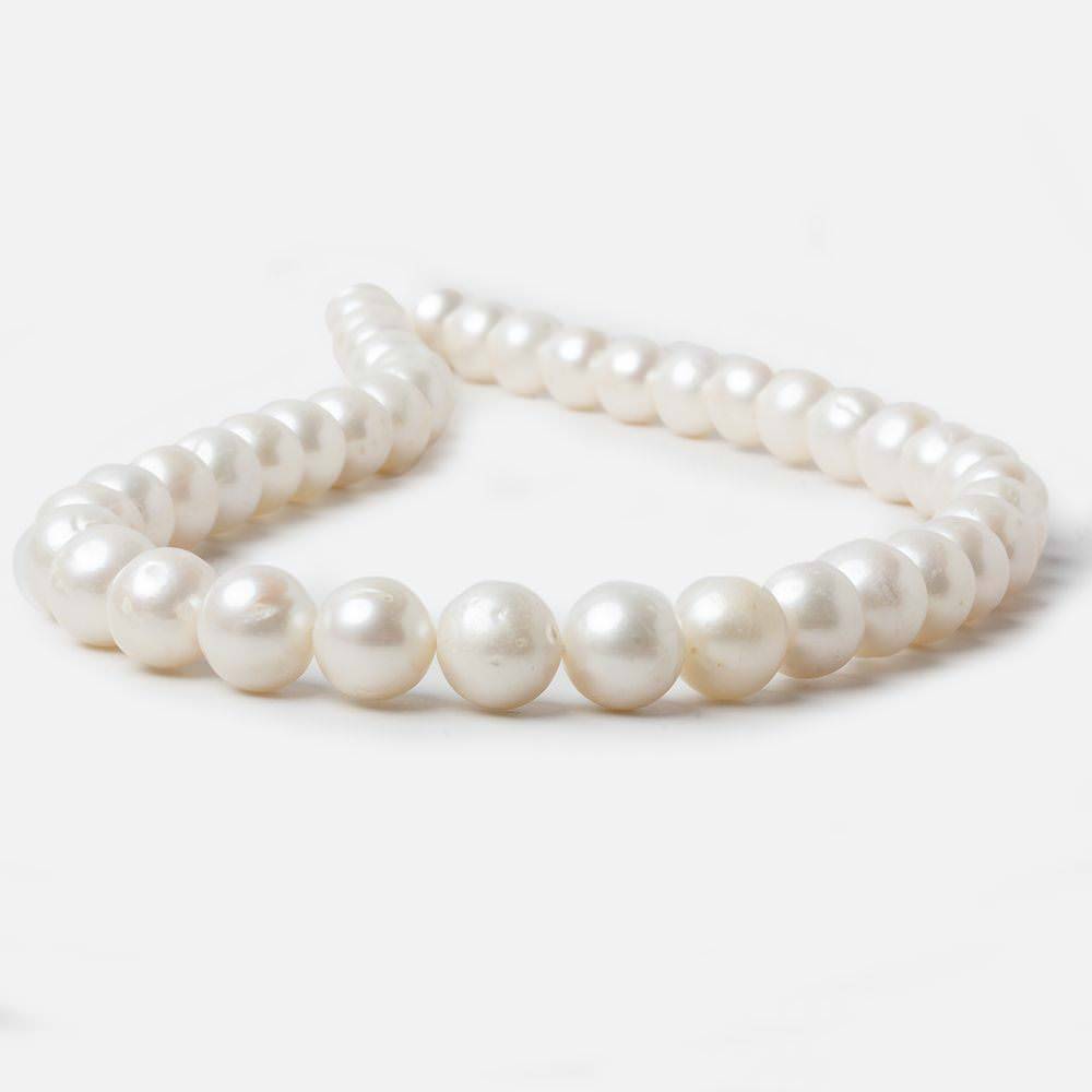 9.5-10.5mm Off White Off Round Freshwater Pearls 15 inch strand 40 pcs - Beadsofcambay.com