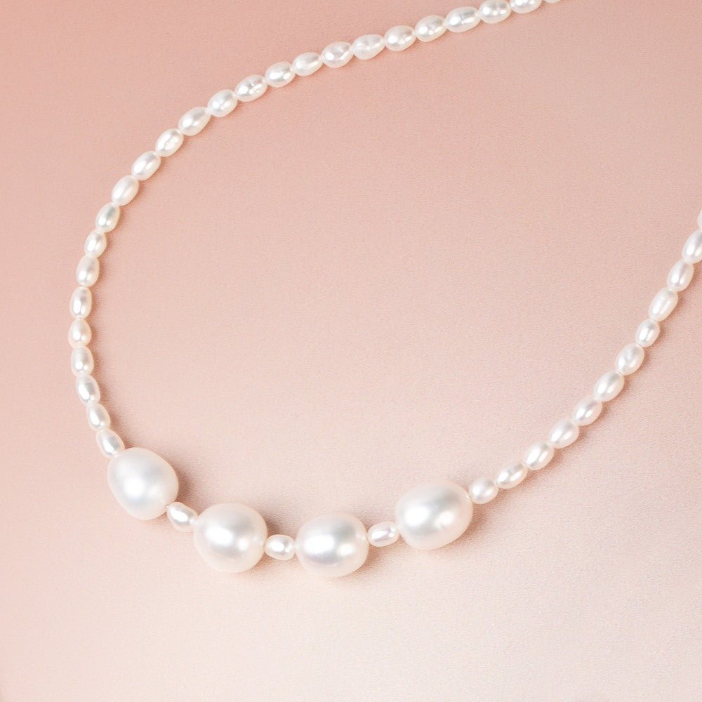 9.5-10mm Off White Oval Freshwater Pearl Set of 4 Beads - Beadsofcambay.com