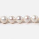 9.5x9-10.5x10mm Cream Rose' Off Round Freshwater Pearls 15.5 inch 42 pcs - Beadsofcambay.com