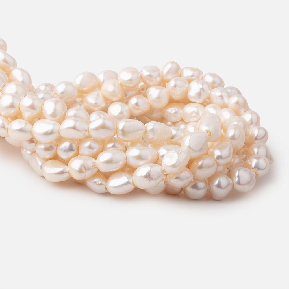 9x10-10x12mm Buttery Cream Baroque 2.5mm Large Hole Pearls 15 inch 33 pieces - Beadsofcambay.com