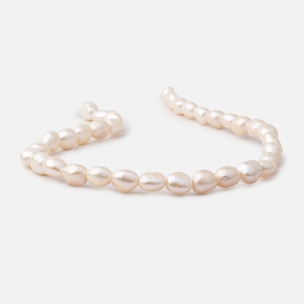 9x10-10x12mm Buttery Cream Baroque 2.5mm Large Hole Pearls 15 inch 33 pieces - Beadsofcambay.com