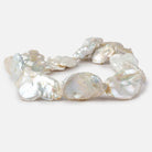 Off White Souffle Straight Drilled Baroque Freshwater Pearls 16 inch 12 beads 31x22-38x23mm - Beadsofcambay.com